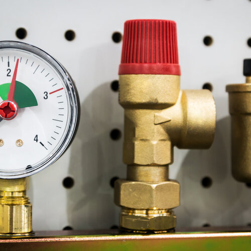 close-up of a gas valve connected to a heating system